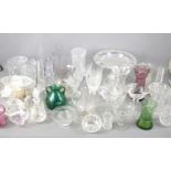 A group of glass and crystal glass to include vases, celery holder, pedestal fruit bowl, coloured