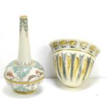 Edith Rogers for Doulton Lambeth: A small bottle shaped vase decorated with floral sprays and a