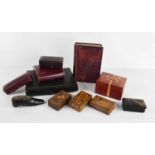 A selection of boxes to include Tunbridgeware examples, a Russian black lacquered snuff box in the
