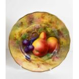 A Royal Worcester plate by E Townsend, painted with pears and grapes to a mossy ground, signed, puce