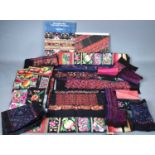 A collection of embroidered Miao minority panels from Southern China together with two books on