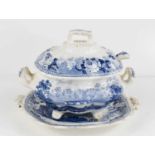 A small 19th century blue and white tureen with dish depicting Castle Richard, and a ladel with