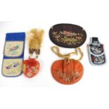 A collection of Chinese purses to include a Da Lian silk purse embroidered with flowers, circa