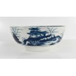 An 18th century Worcester blue and white bowl, depicting a Chinese landscape, repaired with