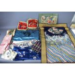 A collection of 19th and 20th century Chinese embroidered and printed cotton fabrics to include