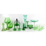 A group of green glassware, to include Bohemian cut glass posy vase and bowl with green overlay, a