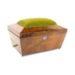 A 19th century rosewood sarcophagus form vanity box, the lid bearing hat pin cushion with mirrored