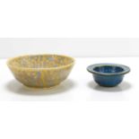 A small Ruskin bowl with yellow underglaze and mottled blue overglaze indistinctly dated 1927 and