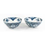 A pair of Makkum Dutch earthenware blue and white glazed bowls, mark to bases.