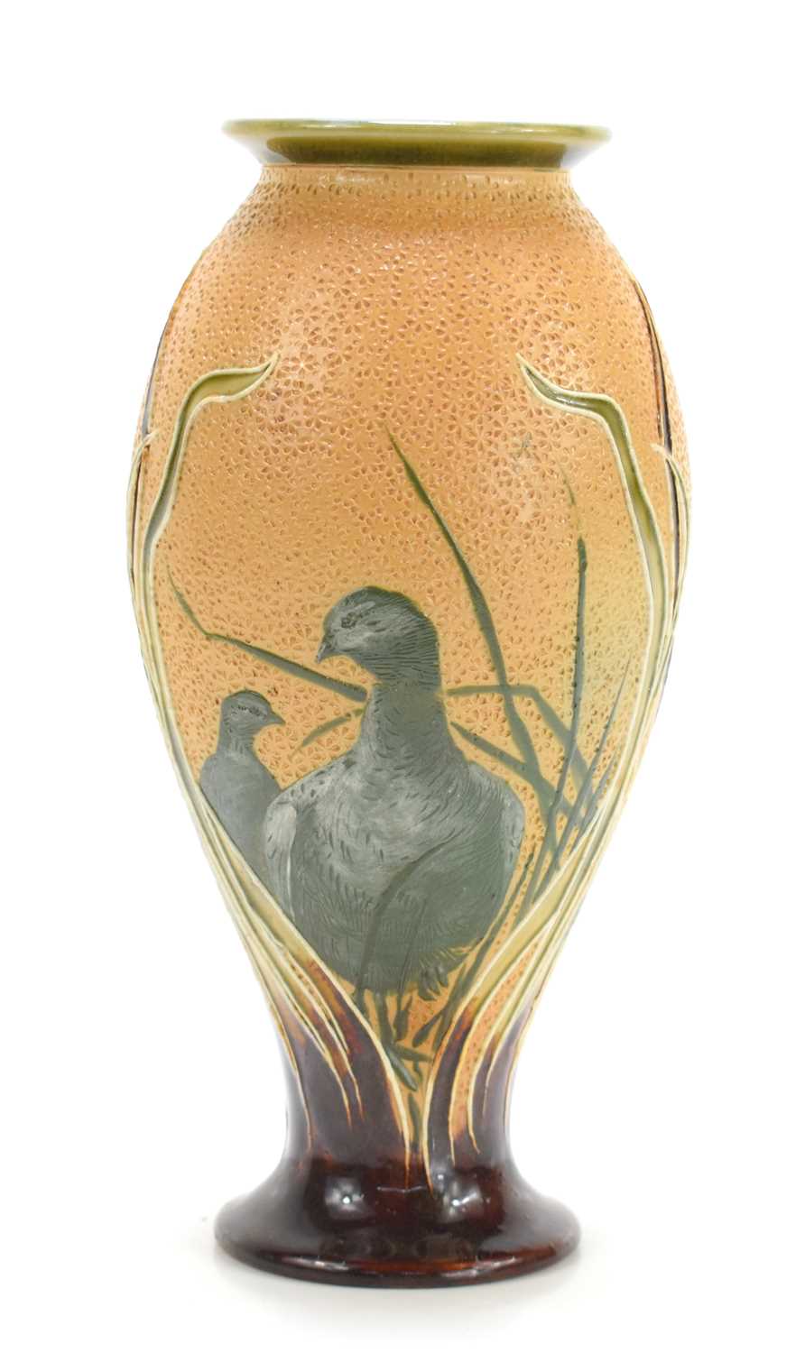 Florence E Barlow for Royal Doulton: A Pate-sur-pate stoneware vase, decorated with birds in