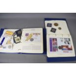 Two albums of The Queens Golden Jubilee coin covers, together with a collection of coins to