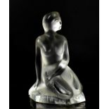 A Lalique frosted glass paperweight figure 'Iona Mermaid', in the form of a kneeling mermaid, signed