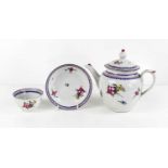 A 19th century teapot, tea bowl and saucer, likely New Hall, painted with pink and blue borders, and