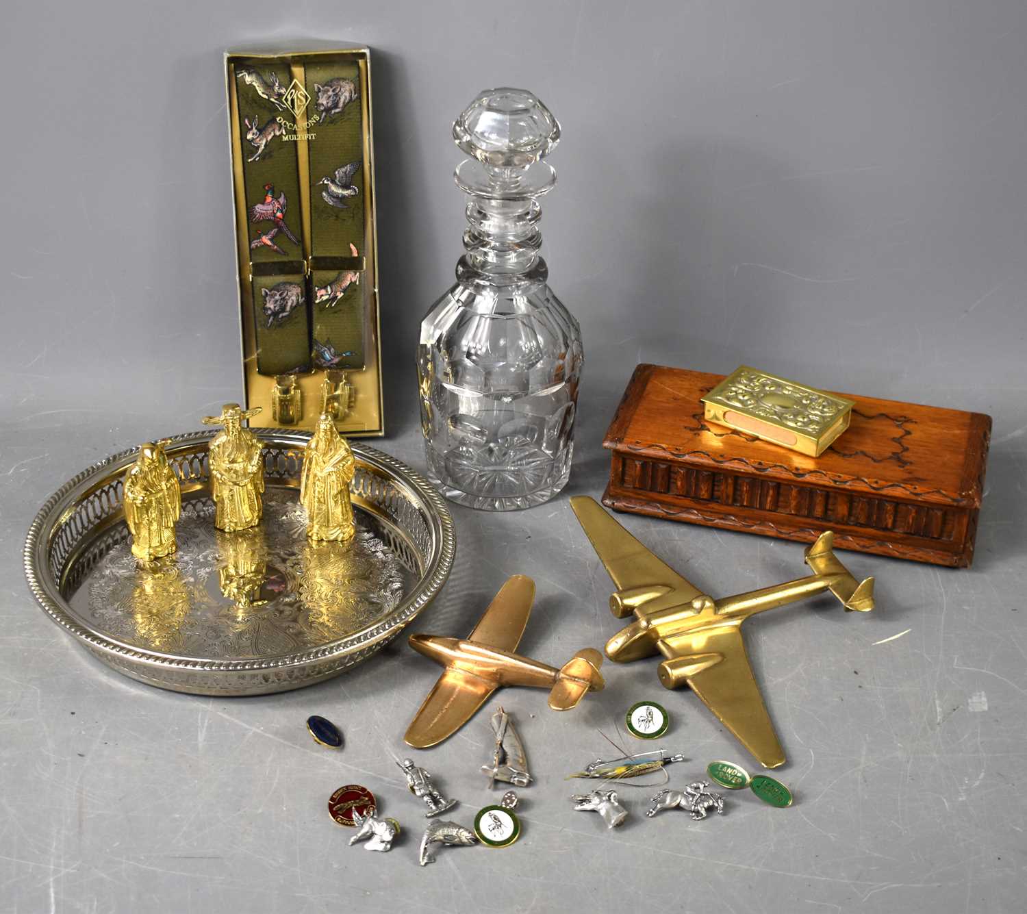 A group of collectables to include A.R Brown pewter animal badges, club badges, brass matchbox