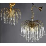 A modernist gilt metal and glass droplet chandelier, of fronded waterfall form, together with two