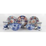 Two Cauldon blue and white bowls, together with a Japanese Imari plate, pair of Delft blue and white