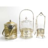 A group of WMF comprising two biscuit barrels and a rare pickle jar with original glass liner and