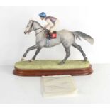 A Border Fine Arts horse and jockey sculpture "Down to the Start" the horse and jockey raised on a