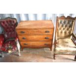 An American oak armchair together with an early Victorian button back armchair with carved scroll