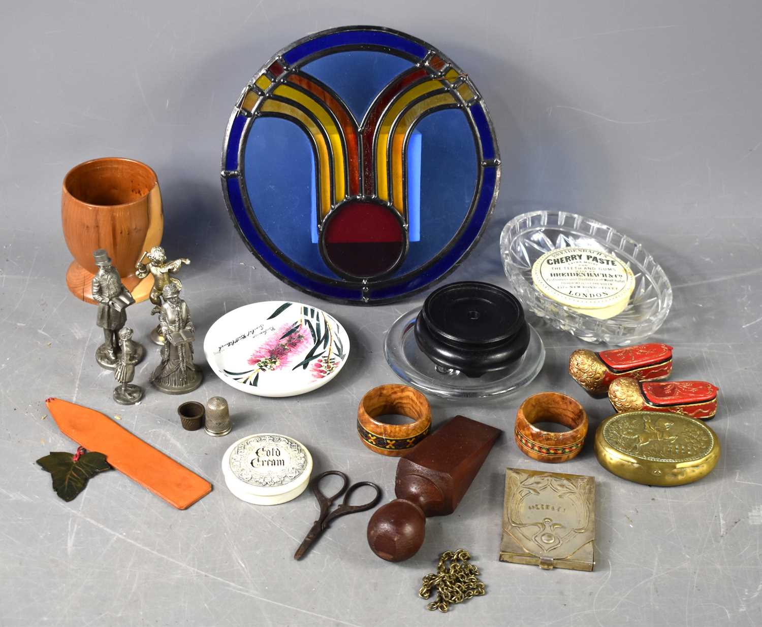 A group of collectables including two black and white transfer printed pot lids for Breidenbach's