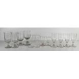 A selection of antique glasses including Georgian and Victorian examples, of various size and form.