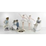 A Lladro figure of a seated ballerina, 21cm high, together with two Noa figures, number 1136,