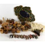 A group of small Chinese porcelain figures, small wicker baskets, Chinese mirror decorated with