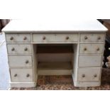 An antique painted pine pedestal desk, a/f, 76cm by 120cm by 61cm.