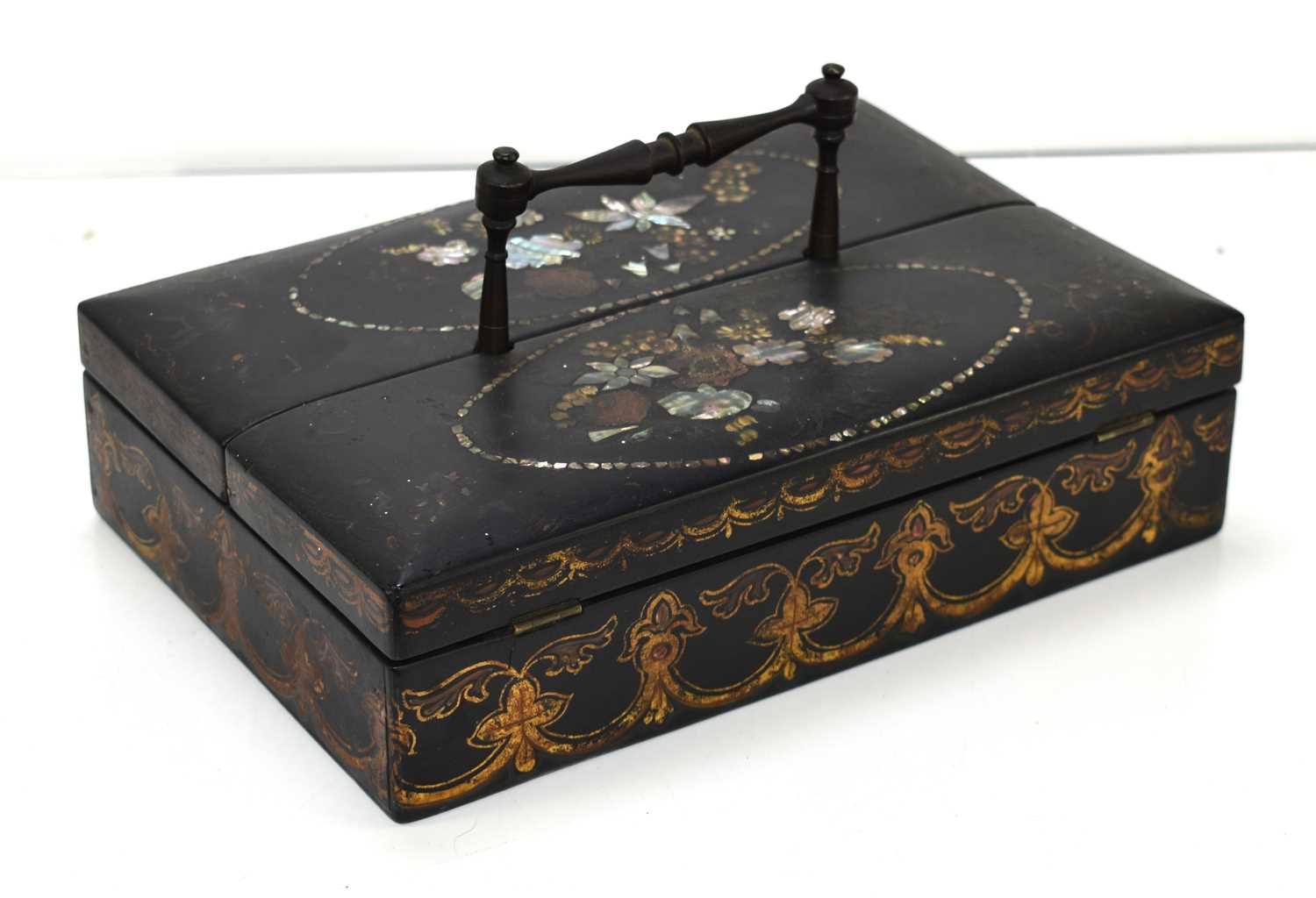 A late Victorian ebonised stationary box with mother of carrying handle and pearl inlay to the