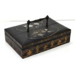 A late Victorian ebonised stationary box with mother of carrying handle and pearl inlay to the