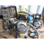 A group of power tools to include bench grinder, angle grinders, Stanley 2kw heater, Titan SDS