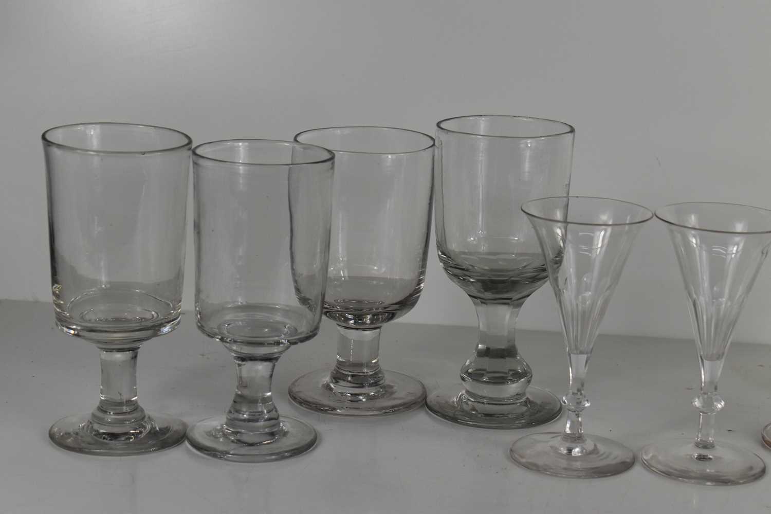 A selection of antique glasses including Georgian and Victorian examples, of various size and form. - Image 3 of 4