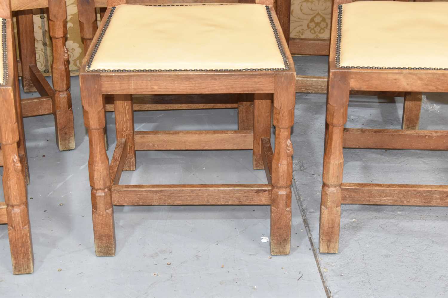 A set of six Robert "Mouseman" Thompson oak lattice back dining chairs with cow hide seats, on two - Image 2 of 4