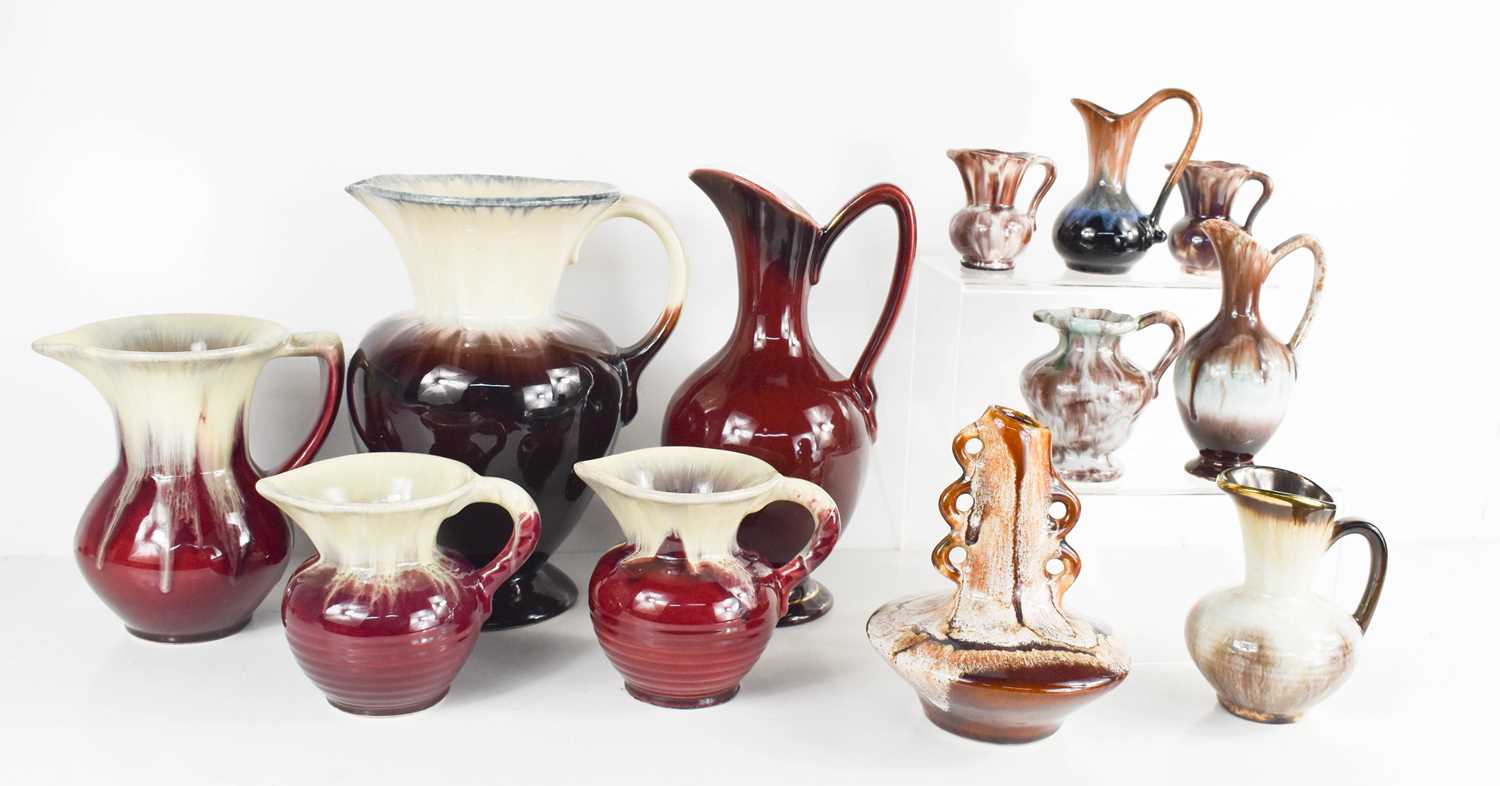 A selection of West German pottery jugs, of the mid-century period, in various glazes and designs.