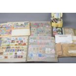 A collection of GB and Worldwide stamps, loose and in albums, to include some early examples