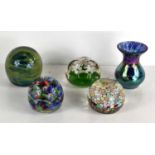 A group of glass paperweights to include a Murano millefiori example together with an art form glass