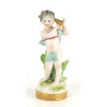 A Continental porcelain figure of a Bacchanalian putti holding a harp, 12cm high.