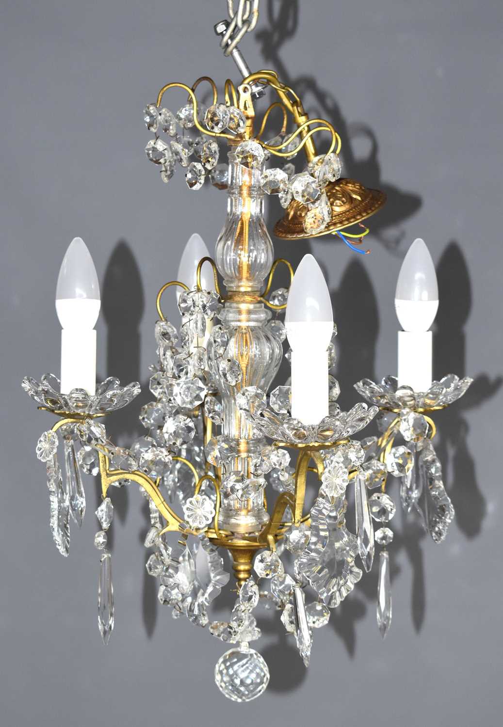 A French 1930's glass and gilt metal four branch chandelier, later refurbished the central column - Image 2 of 3