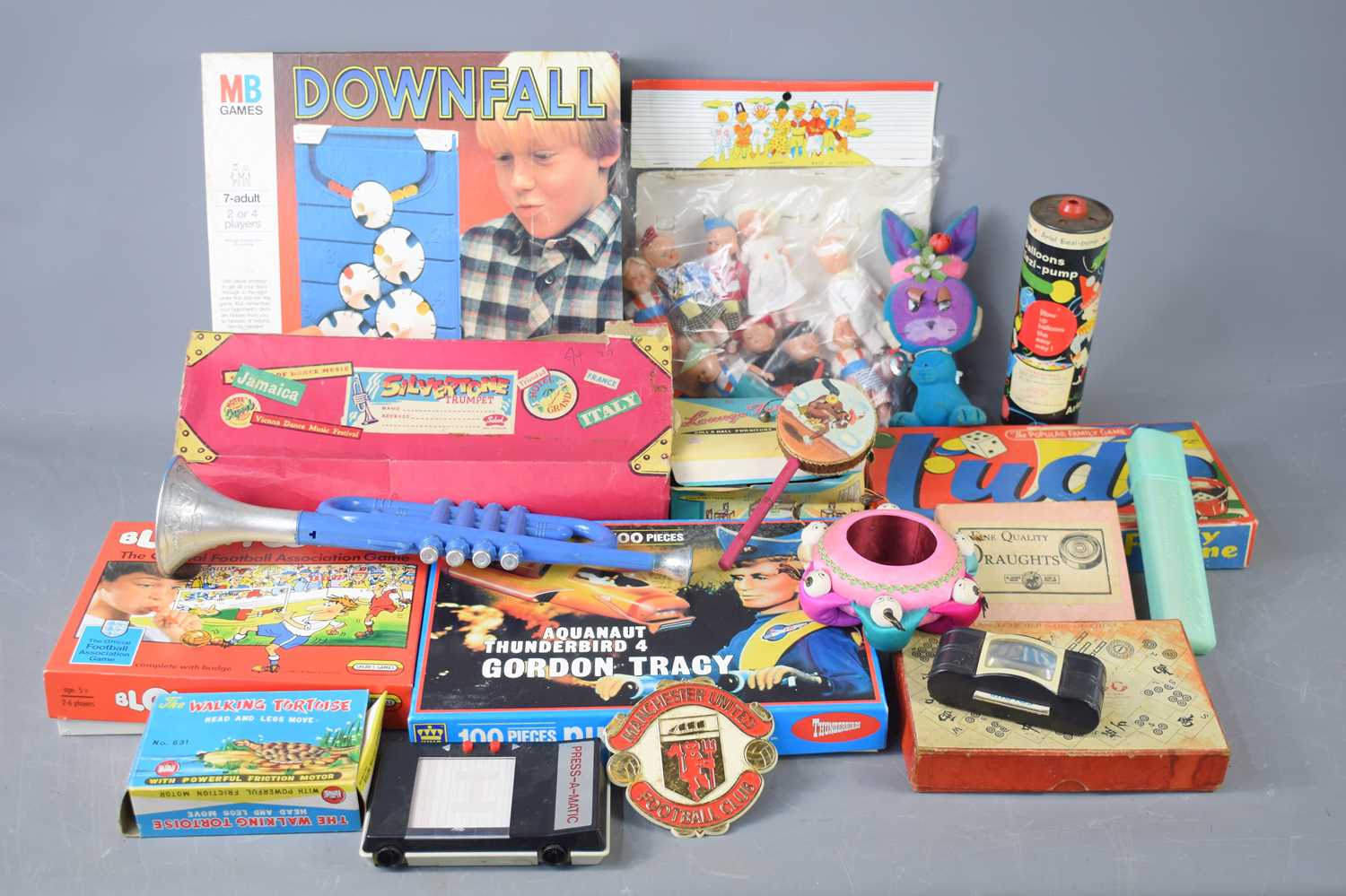 A large group of vintage toys and games to include Chad Valley Mah-Jongg, a boxed walking