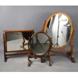 A group of three Victorian toilet mirrors, one of rectangular form with reeded columns and stretcher