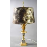 An American style 1980s pineapple lamp in steel and gold coloured metals, and mottled metallic