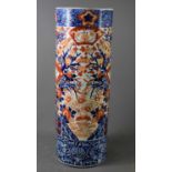 A Japanese Imari umbrella stand, depicting birds amidst flowers and foliage, 62cm high. A/FCrack