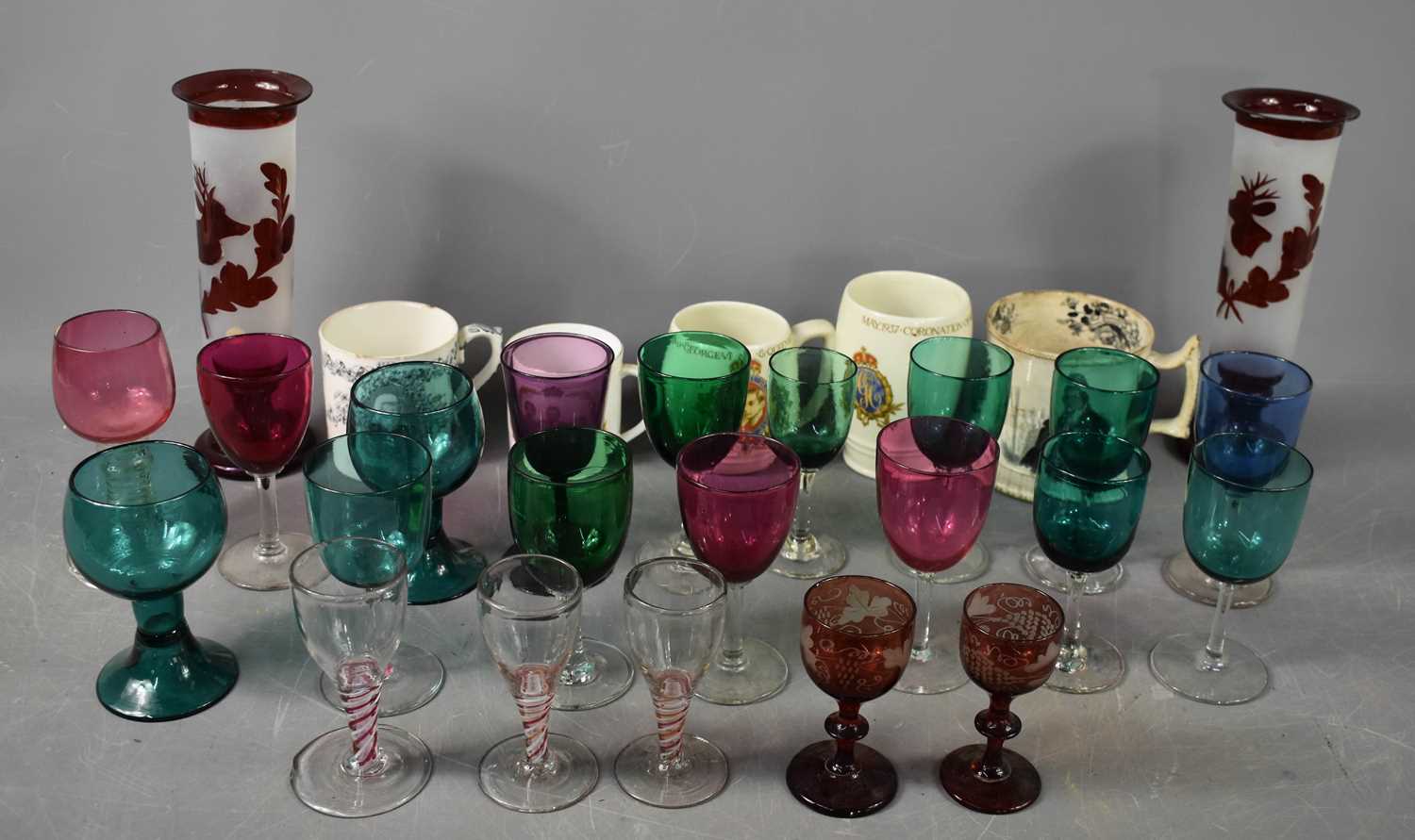 A selection of 19th century and later glassware, including three spiral twist glasses, a pair of red