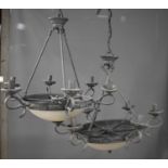 A pair of Empire style black painted metal ceiling lights, with opaque domed shades and six