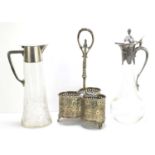 Two WMF claret jugs, the cut glass bodies with silver plated tops, one of plain design, the other