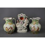 A pair of Staffordshire water jugs, titled 'Willie Brewd a Peck O Malt', 25cm high, together with