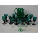 A selection of mid 20th century green glassware, to include jug, and glasses of various form.