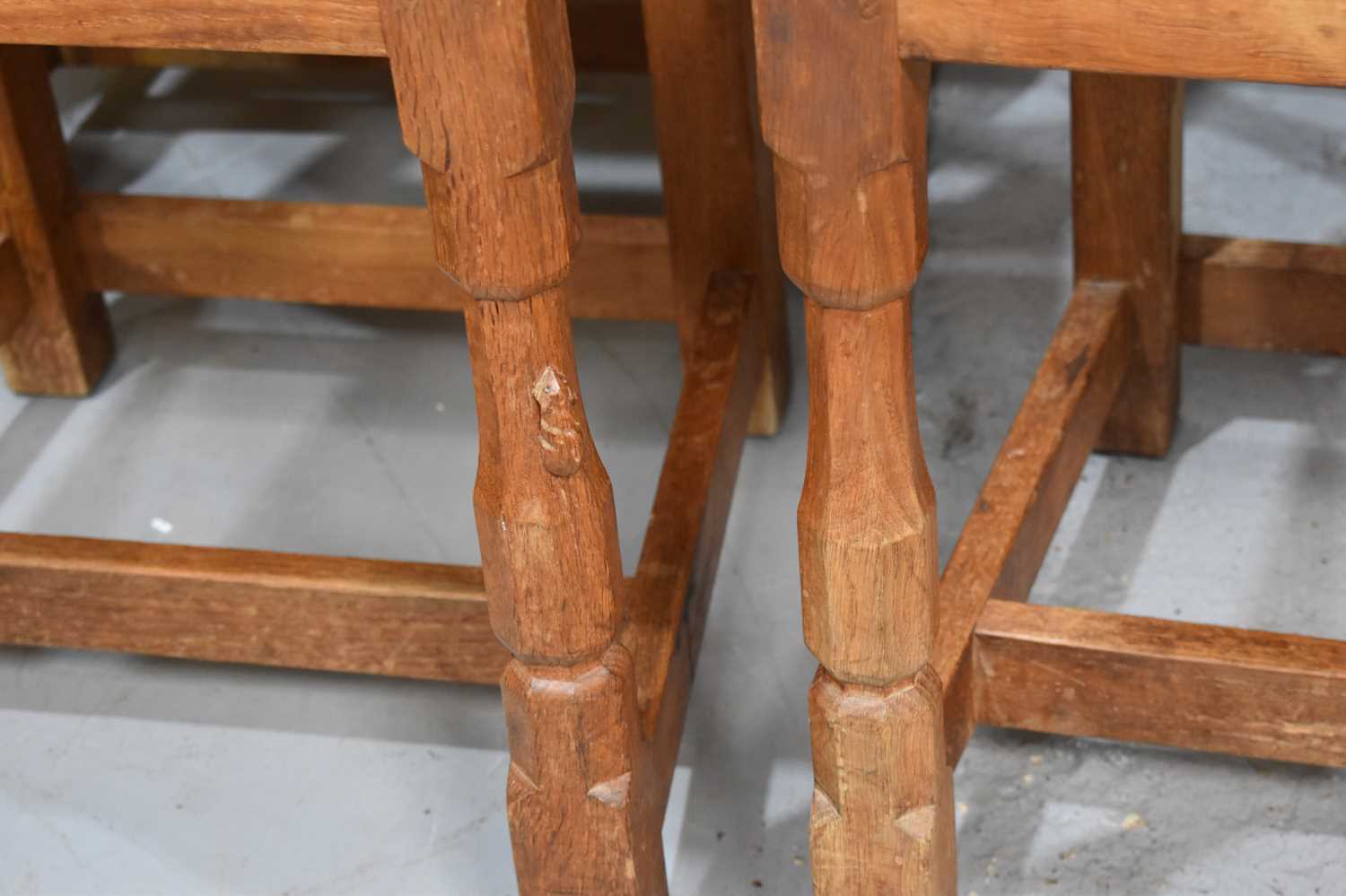 A set of six Robert "Mouseman" Thompson oak lattice back dining chairs with cow hide seats, on two - Image 3 of 4