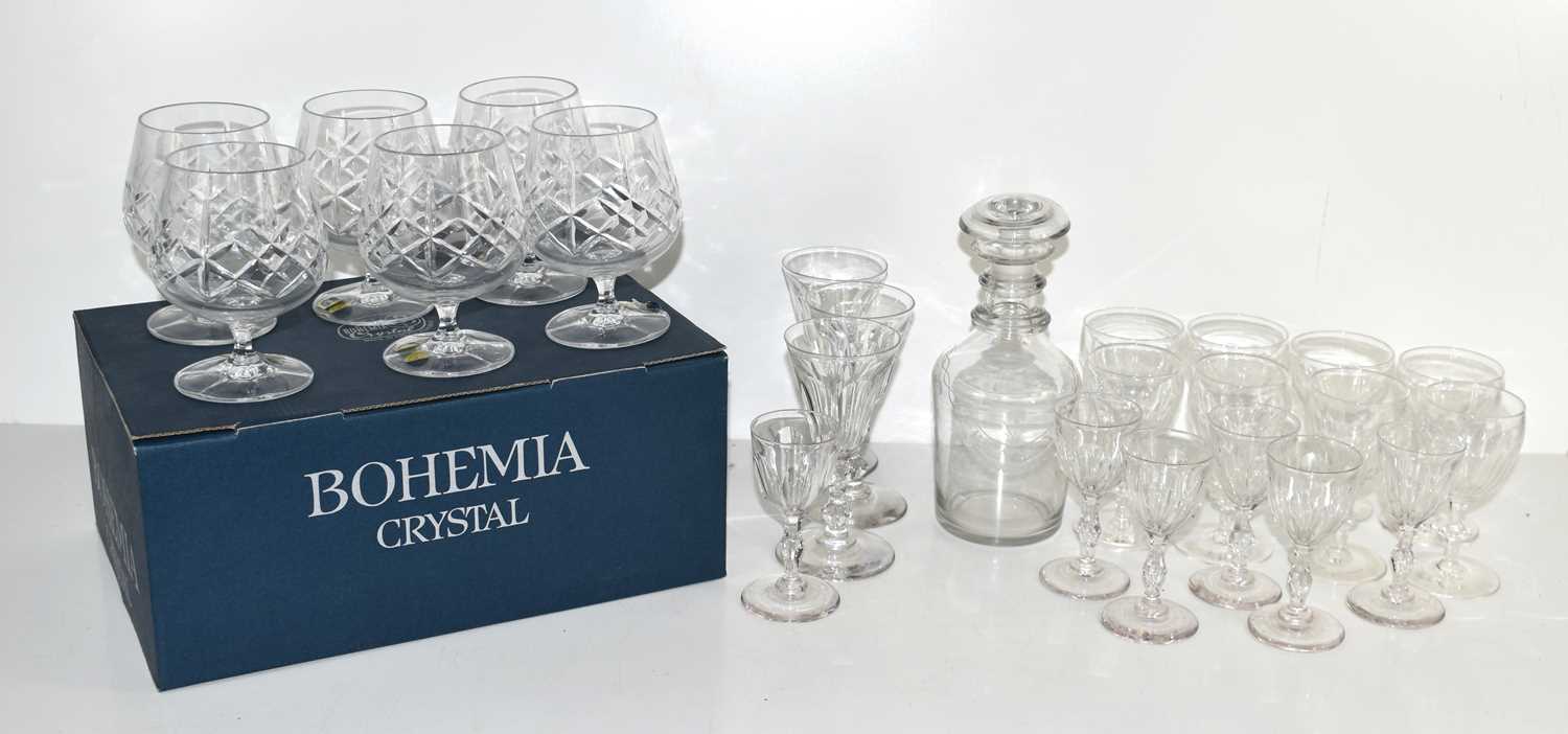 A collection of 19th and 20th century cut glasswares, comprising a set of three and two sets of