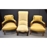 A pair of 19th century bow armchairs, with scroll arms, upholstered in gold coloured brocade to